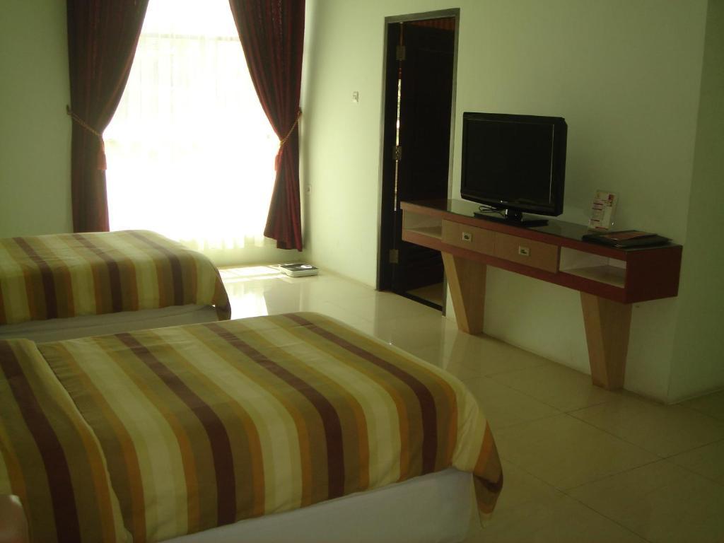Golden Harvest Hotel Jambi Ruang foto